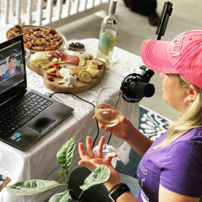jonelle spiker runs a virtual wine tasting from her computer